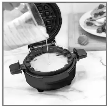 NOSTALGIA MSW5IVY 5-Inch Stuffed Waffle Maker - Carefully pour batter into the center of the lower cooking surface