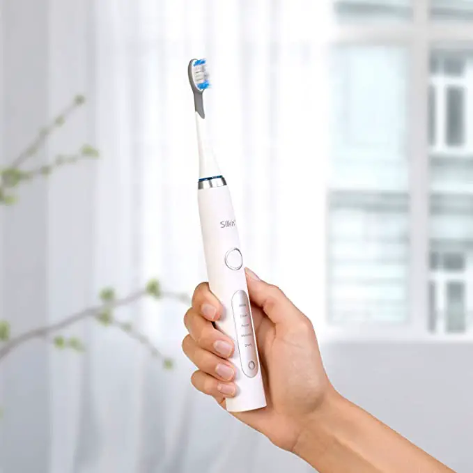 Silkn Sg-986 Sonicsmile Deluxe Electric Toothbrush User Manual Silkn Sg-986 Sonicsmile Deluxe Electric Toothbrush User Manual