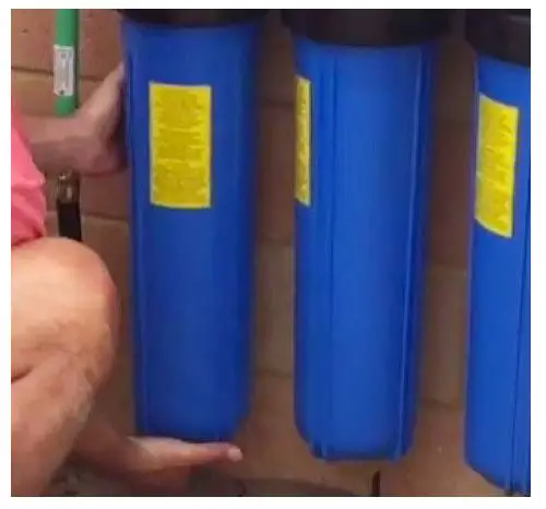 MWF Big Blue Whole House Water Filtration Systems - Ensure the cartridges center hole are seated in the stump in the base of each housing