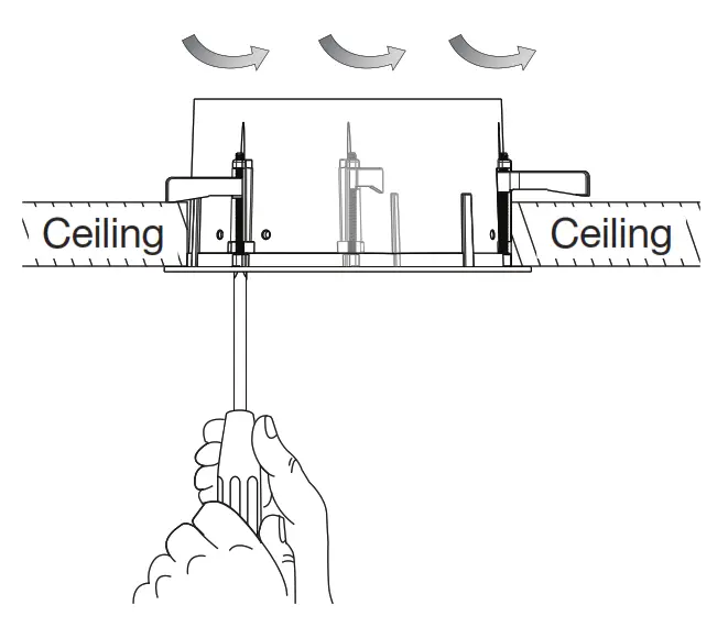 Using a Phillips head screwdriver