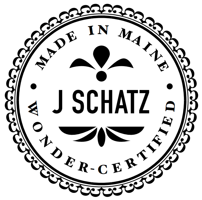 J SCHATZ - logo