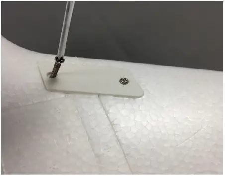 Locate Plastic wing Anchors and Screws Cont.