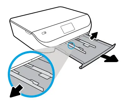 Pull out paper tray, slide guides out