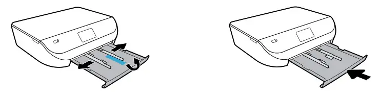 Slide guides out. Push tray in