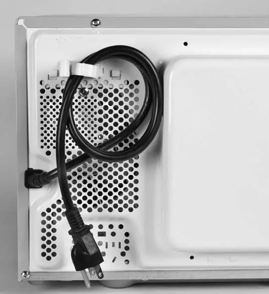 NOSTALGIA NRMO9SERIES Retro 0.9 Cu. Ft. Microwave Oven - CORD LOCATION