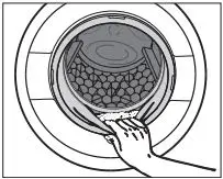 Miele Washing machine User Guide - Check the folds in the door seal for any small articles