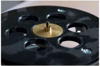 WISDOM Solid Surface Mounting Kit Owner’s Manual - Bottom of the Router with bushing and bit installed