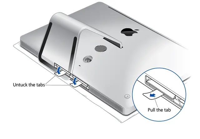 Untucking the tab in the memory compartment