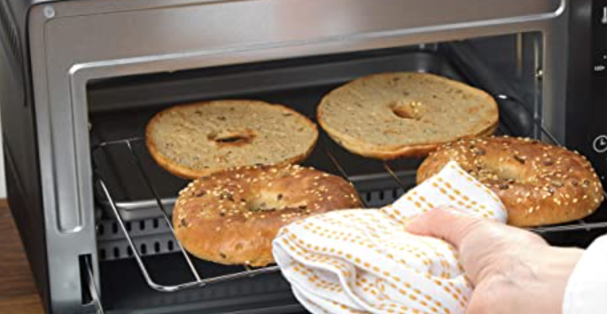 Tuontitukku 72431 Mini Oven Instruction Manual Tuontitukku 72431 Mini Oven Instruction Manual