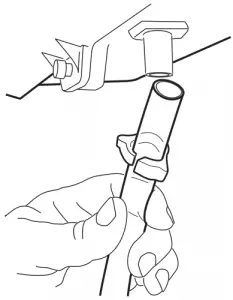 Installing the drain tubing.