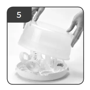 Using your Microwave Steam Steriliser Place the lid over 5
