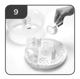 Using your Microwave Steam Steriliser Remove the sterilised items 9