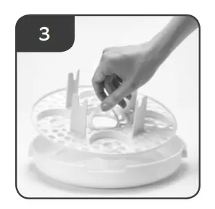 Using your Microwave Steam Steriliser Replace the tray 3