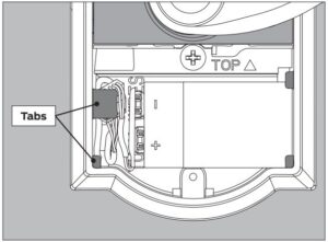 Fig 13 Place battery in holder and tuck wires