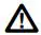 AMPROBE Lamp Tester User Manual - Warning or Caution icon