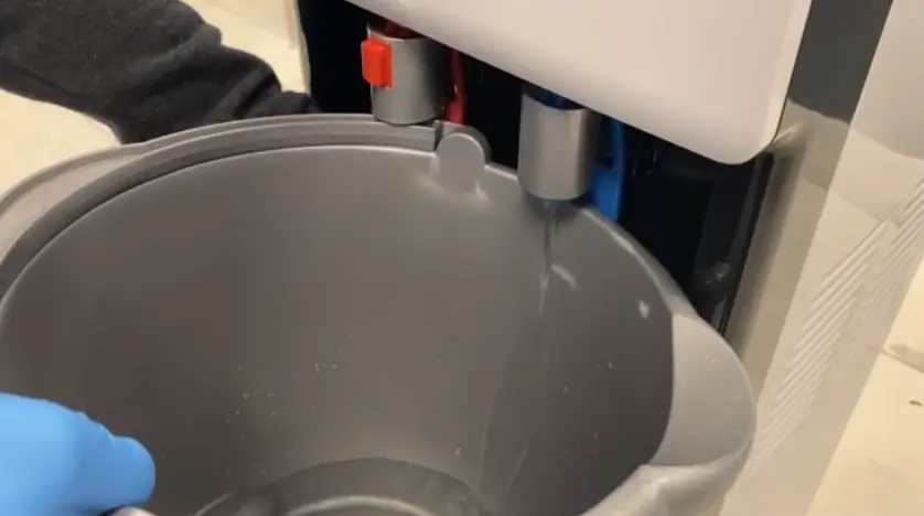 drain a bit of water