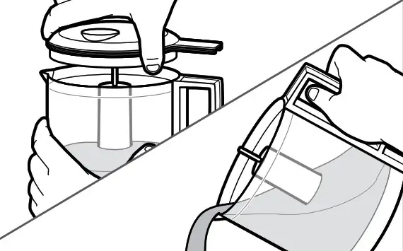 KitchenAid USING THE FOOD CHOPPER- Once processing