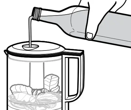 KitchenAid USING THE FOOD CHOPPER- Slowly pour liquids