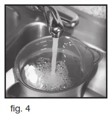 Fill the reservoir as shown