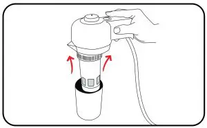 Remove the Control Lid and Filter Basket Assembly from the Cleaning Cup.
