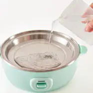 DASH DELUXE Express EGG COOKER K50780 - omelette bowl 1