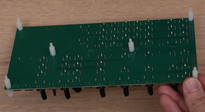 Connection of the top and bottom boards 10