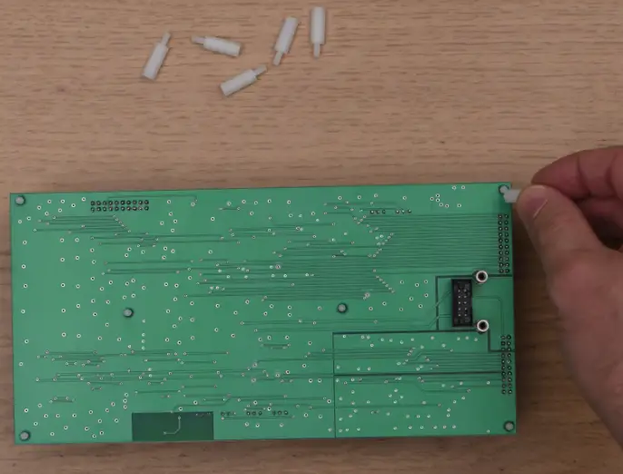 Connection of the top and bottom boards 14