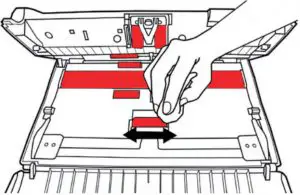 Wipe the indicated area in RED with the cleaning cloth