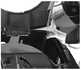 a chair sitting in front of a car