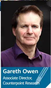 a man smiling for the camera