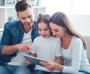 a group of people sitting and looking at the camera