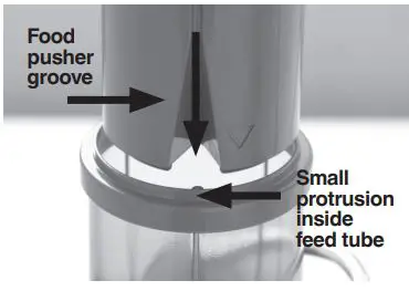 Sage BJE430 the Nutri Juicer Cold User Guide - Slide the food pusher down the food chute by aligning the groove in the food pusher