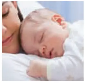 a person lying on a bed