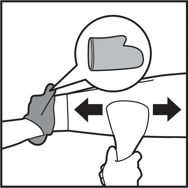 Put the glove on the hand you are using to hold a garment