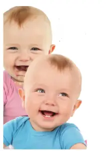 a small child smiling at the camera