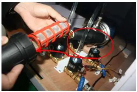 Betson Enterprises Ice Man Coastal Amusements Owner's Manual - Clean the filter