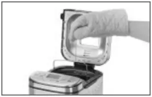 Cuisinart CBK-110 - To remove bread from the pan - a