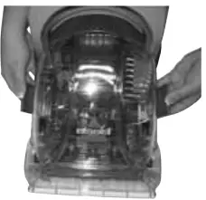 Emptying-Bissell-76R9-collection-tank