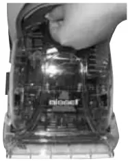 Emptying-Bissell-76R9-collection-tank