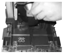 Emptying-Bissell-76R9-collection-tank