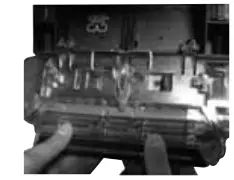 Emptying-Bissell-76R9-collection-tank