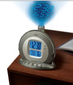 a remote control sitting on top of a wooden table