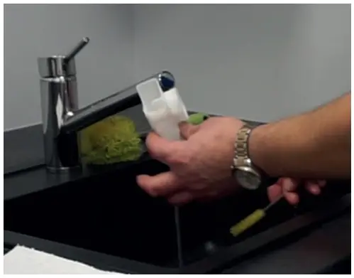 Cleaning the the Elbows of the Soluble Ingredients Canisters