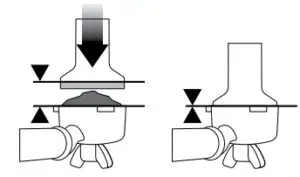 TAMPING THE GROUND COFFEE