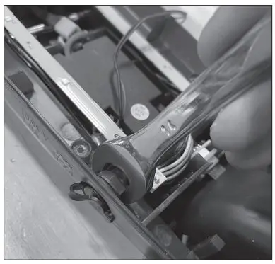 Razor W13111701106 Electric Party Pop Electric Tekno Charger Port Replacement Instruction Manual - Using a 14 mm open wrench, loosen up and remove the lock nut from inside the unit and push the charger port out the frame