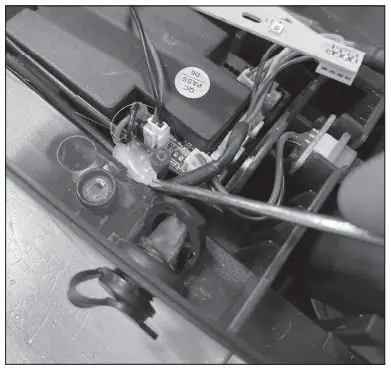 Razor W13111701106 Electric Party Pop Electric Tekno Charger Port Replacement Instruction Manual - Being careful not to damage any wires, remove the plastic glue that keeps the wires in place