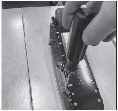 Razor W13111701106 Electric Party Pop Electric Tekno Charger Port Replacement Instruction Manual - Using a Phillips screwdriver, remove the ten (10) screws from the bottom of the unit