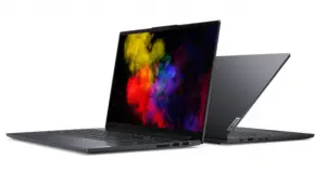 an open laptop computer sitting on top of a table