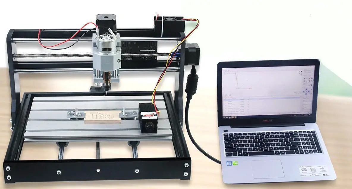 a laptop computer sitting on top of a desk