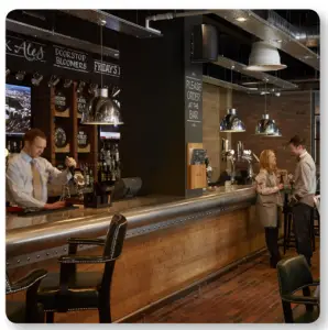 a group of people in a kitchen